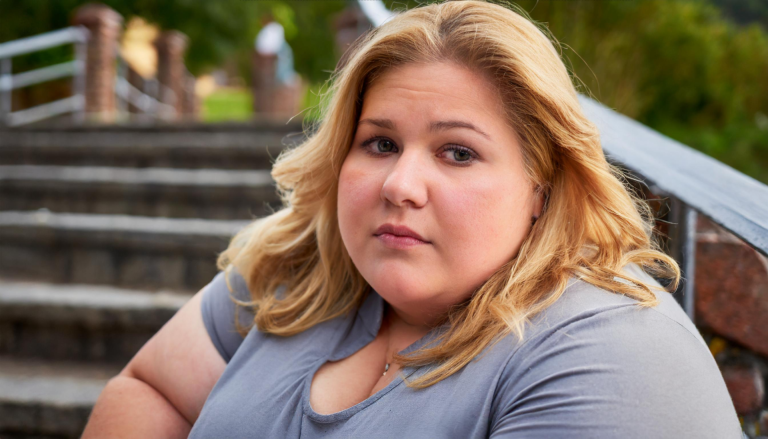 big woman feeling sad