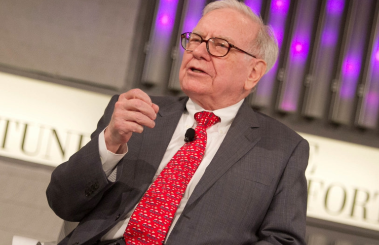 warren buffet in suit and red tie