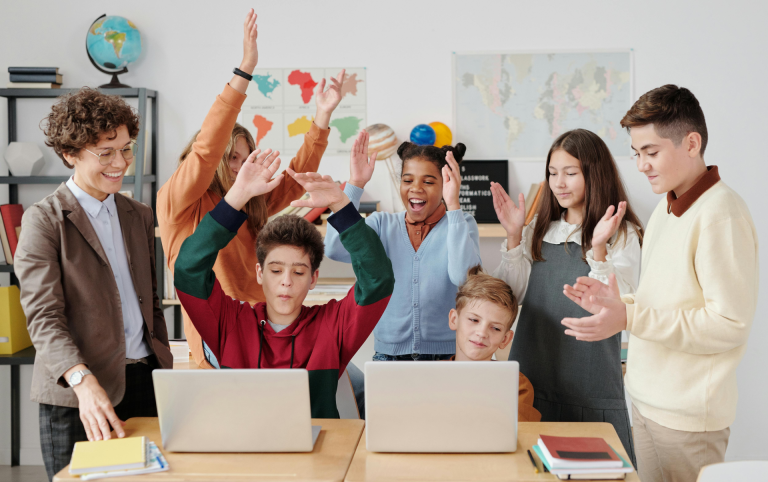 motivated students having fun in the classroom