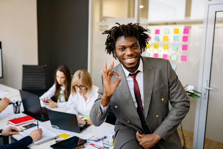 a good team leader: a happy team leader with his team